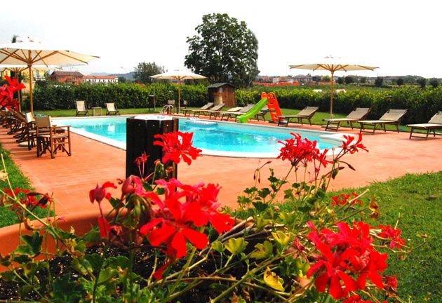 A pool among the gardens in the Veneto countryside